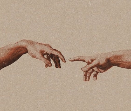 Two hands reaching out for each other.